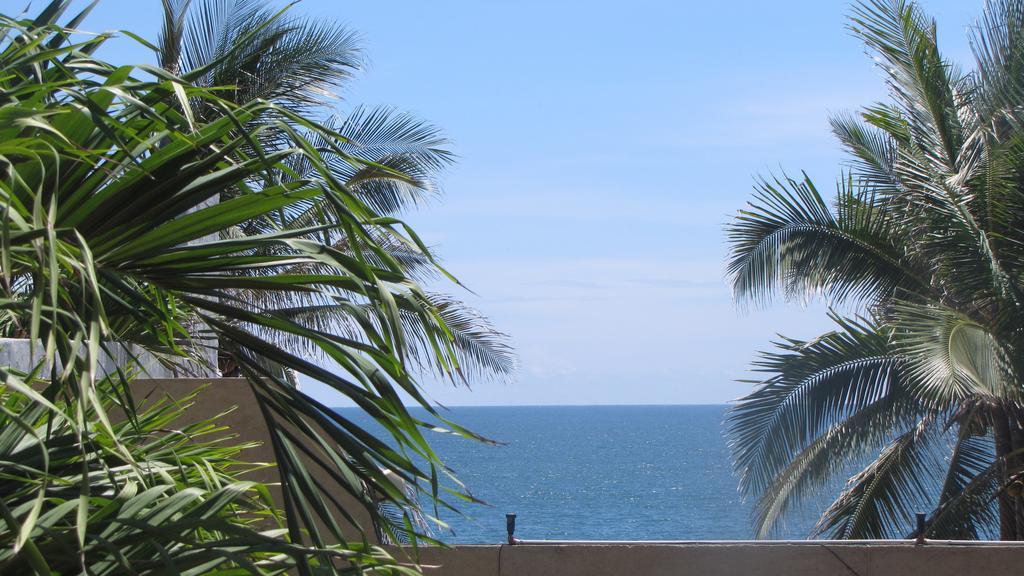 La Paloma Oceanfront Retreat Hotel ซาน พาทริชิโอ เมลาเก ห้อง รูปภาพ