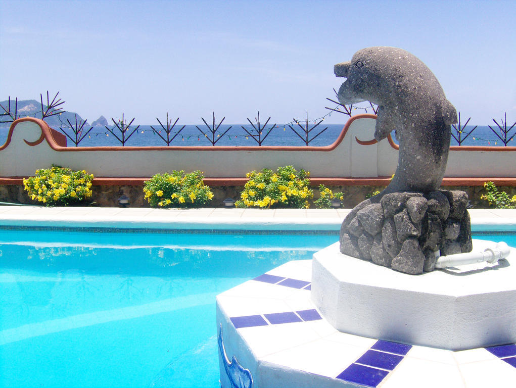 La Paloma Oceanfront Retreat Hotel ซาน พาทริชิโอ เมลาเก ห้อง รูปภาพ